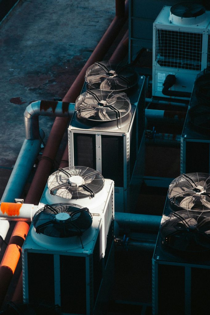 a group of air conditioners sitting next to each other